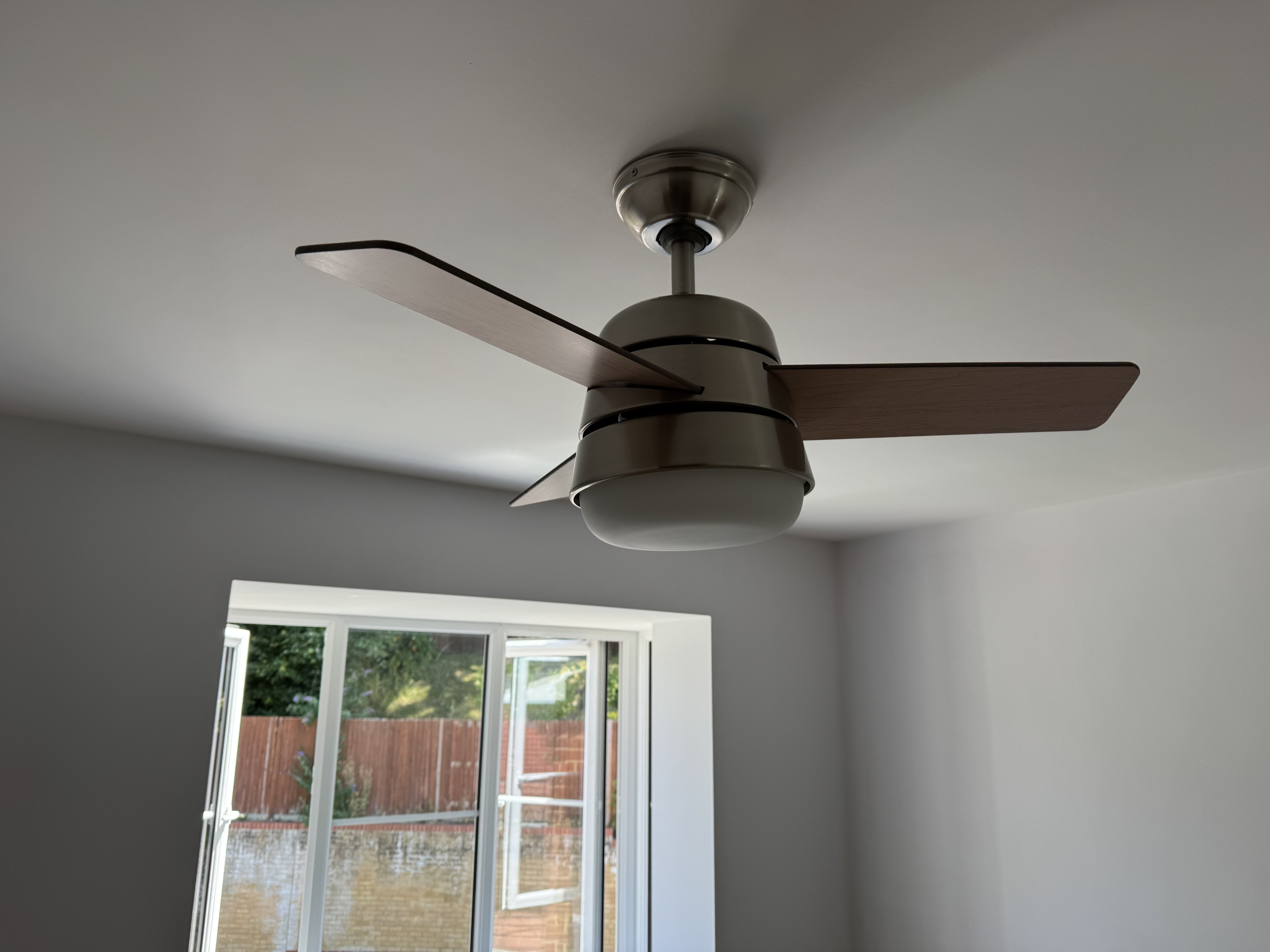New timber support fixed between the loft joists to safely carry the weight of the ceiling fan